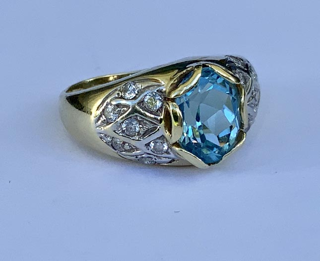18ct Gold Blue Topaz and Diamond ring valued $2990